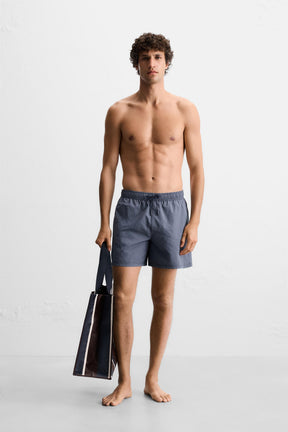 STRIPED MID-LENGTH SWIMMING TRUNKS - Image 1