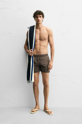 BASIC MID-LENGTH SWIMMING TRUNKS - Image 1