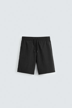 BASIC LONG SWIMMING TRUNKS - Image 1
