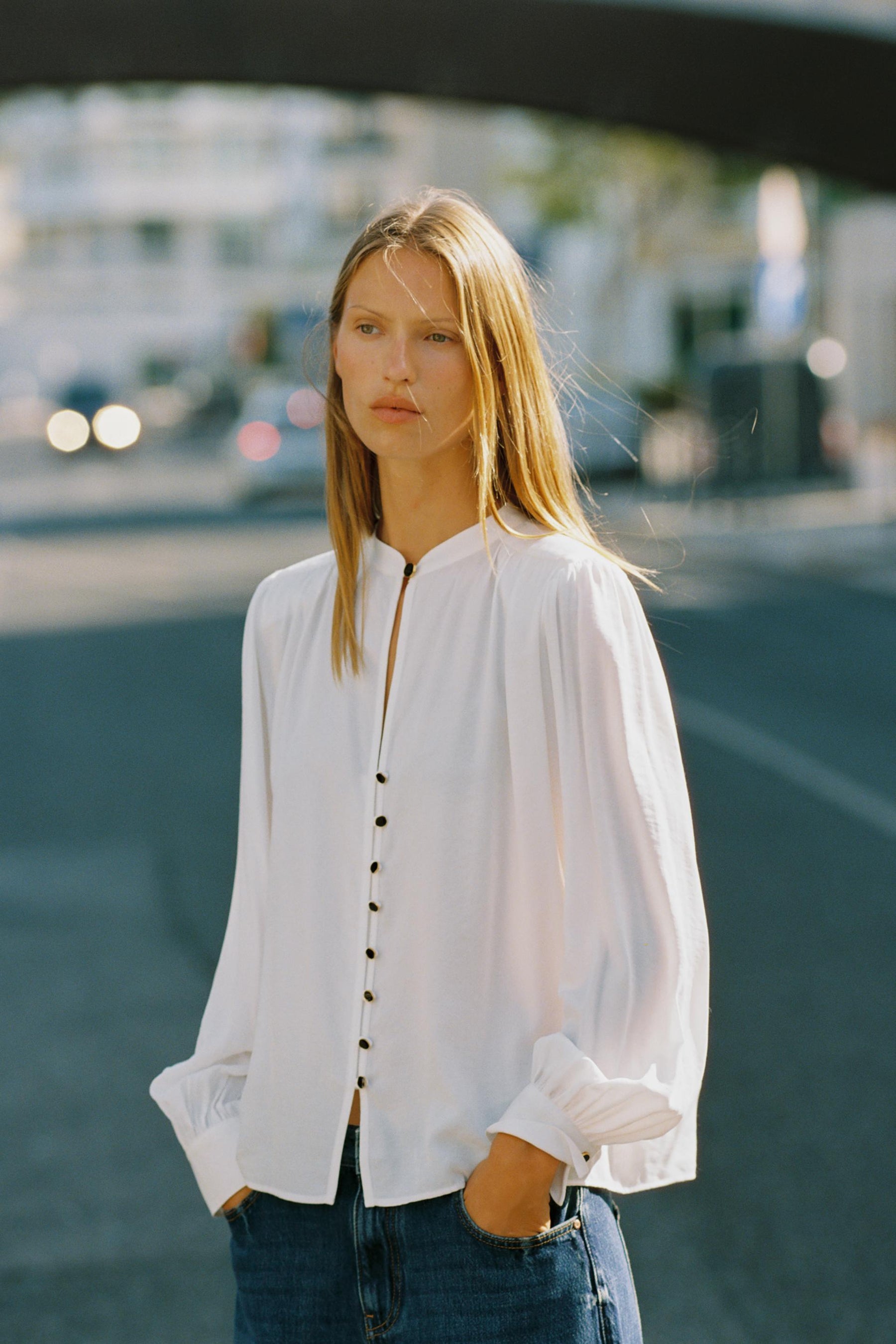 Shirt with shoulder pads