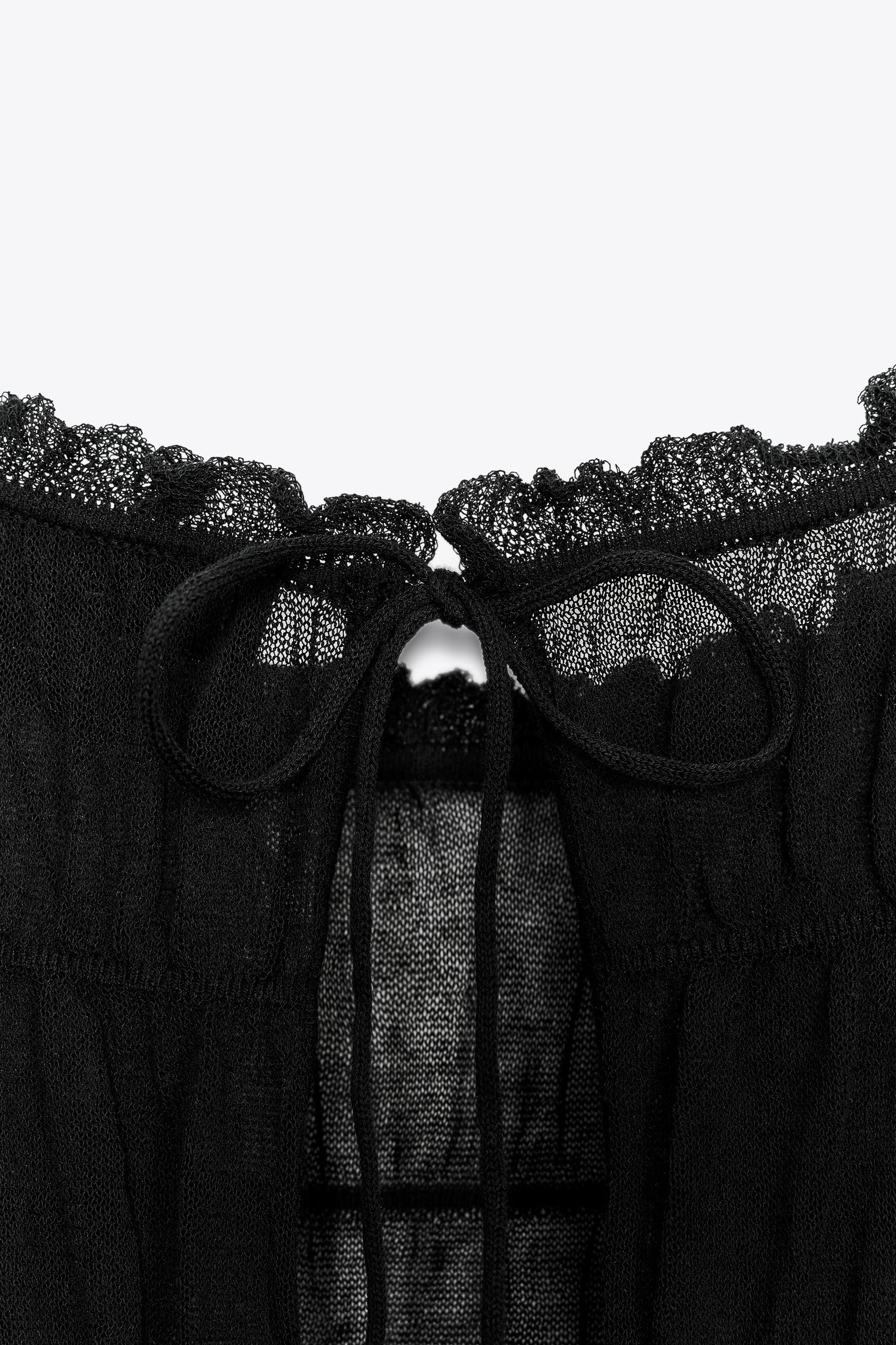 Semi-sheer knit blouse