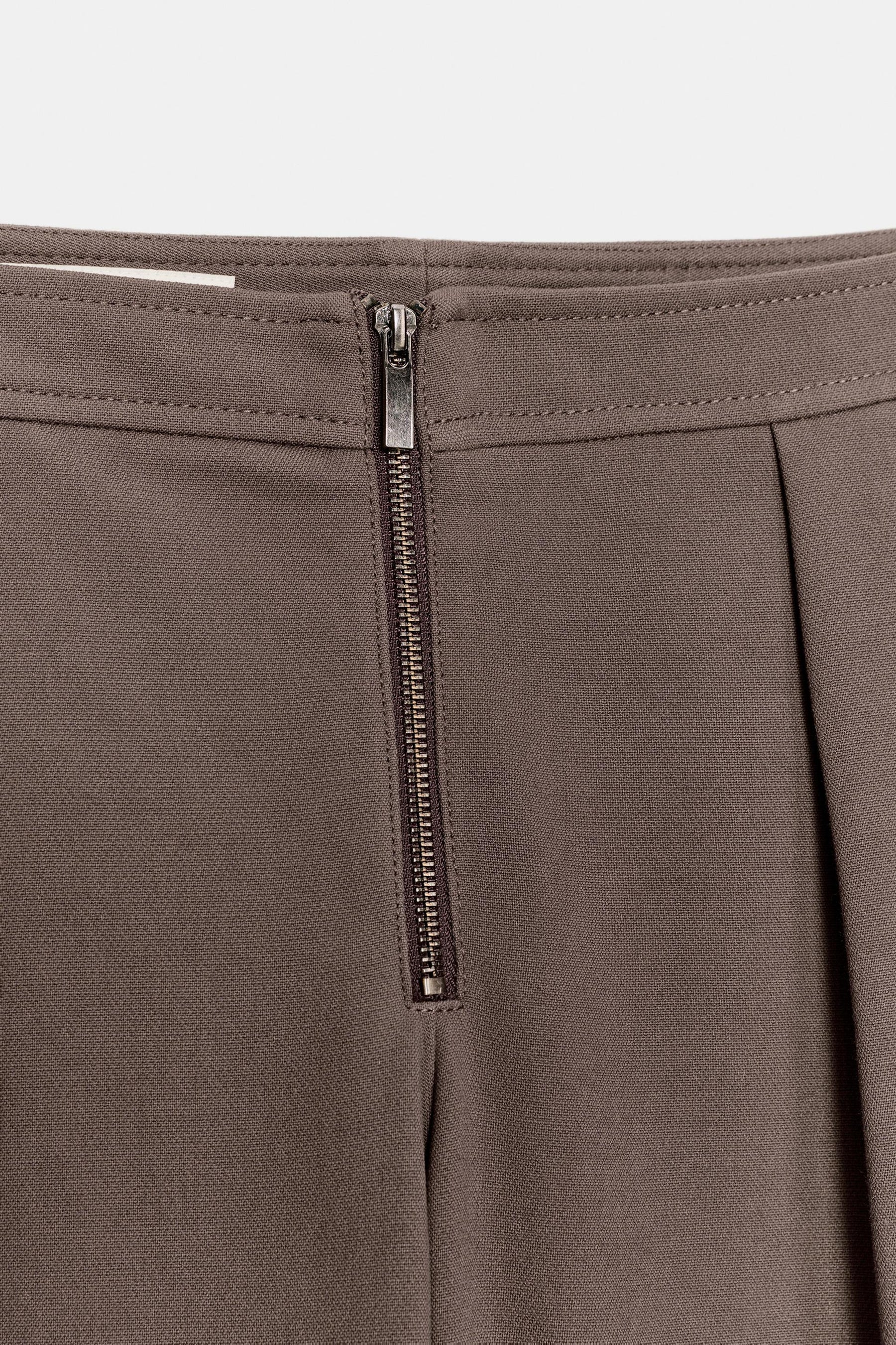 Zip-up Carrot Trousers