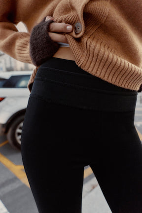 Slim-fit trousers with zipped