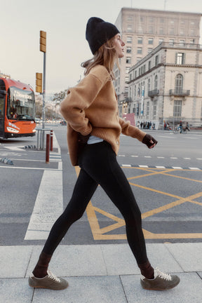 Slim-fit trousers with zipped