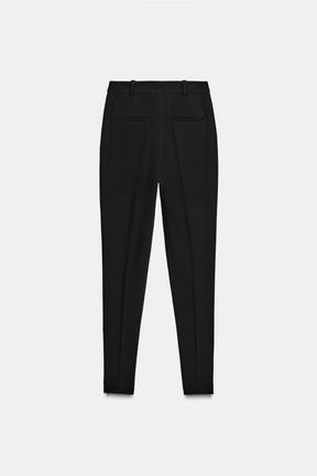 Slim-fit trousers with zipped