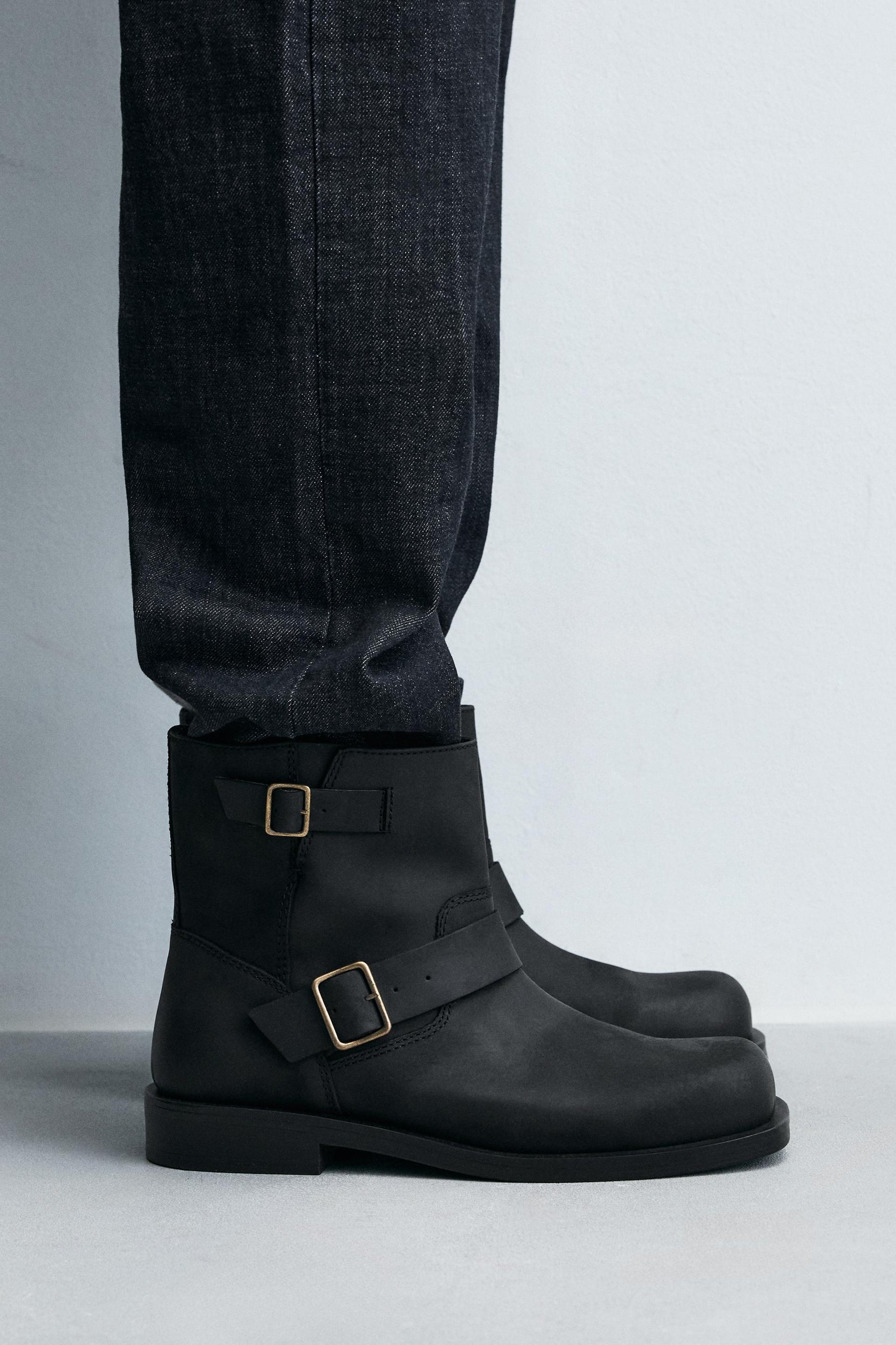 BUCKLED LEATHER BOOTS - Image 1