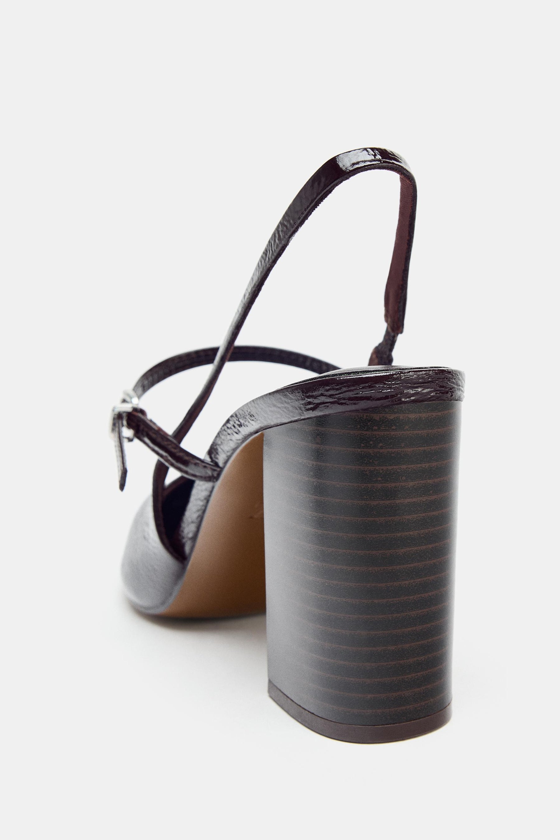 Faux patent slingback heels