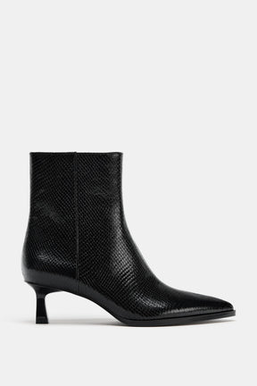 EMBOSSED ANKLE BOOTS