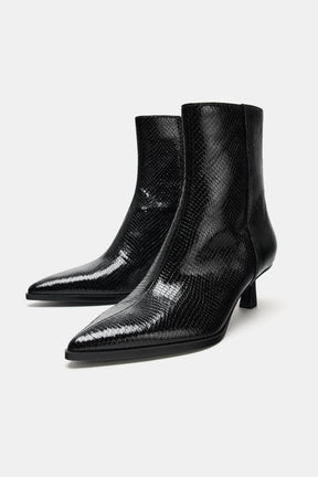 EMBOSSED ANKLE BOOTS