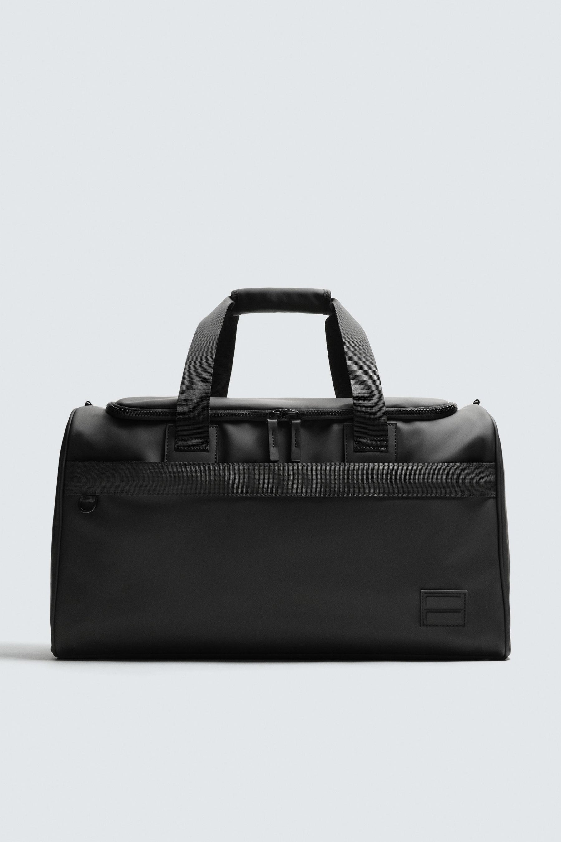RUBBERISED TRAVEL BAG