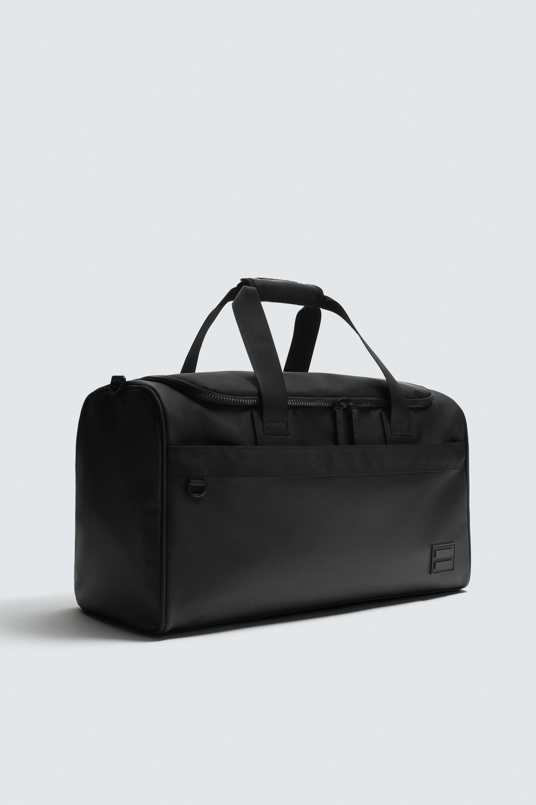 RUBBERISED TRAVEL BAG