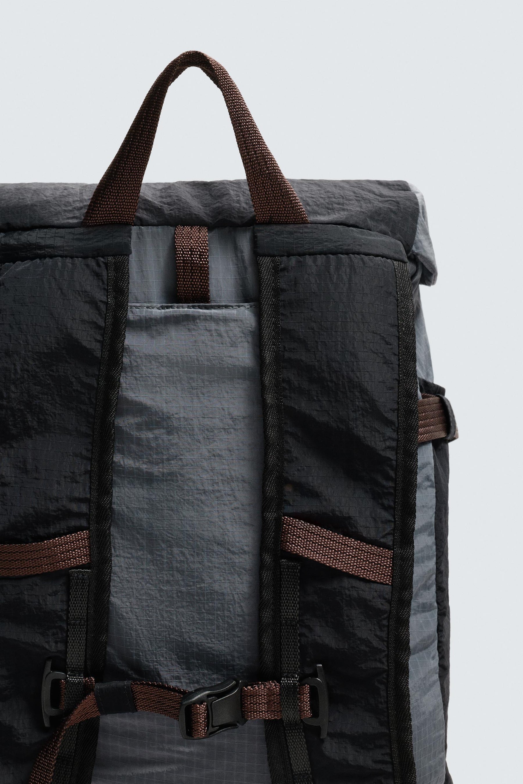 TECHNICAL BACKPACK WITH LEATHER DETAILS