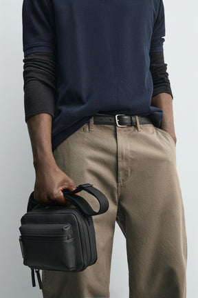 RUBBERISED TEXTURED CROSSBODY BAG - Image 1