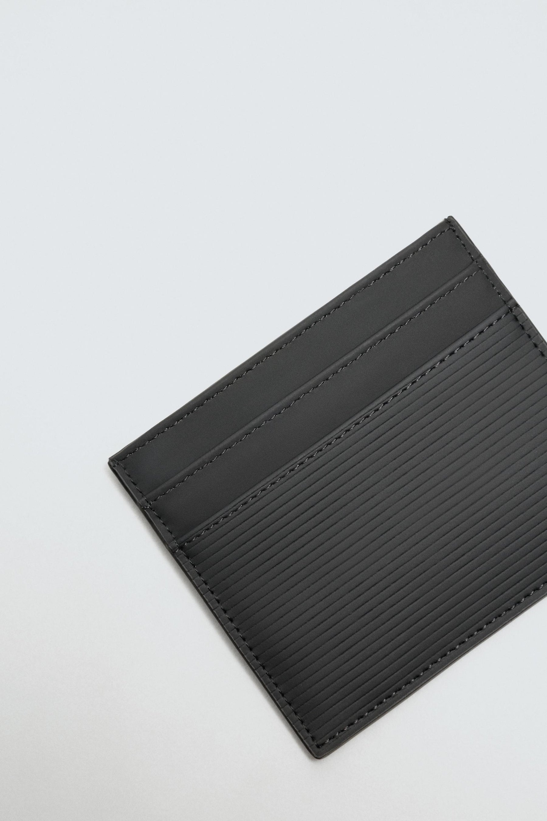 RUBBERISED CARD HOLDER