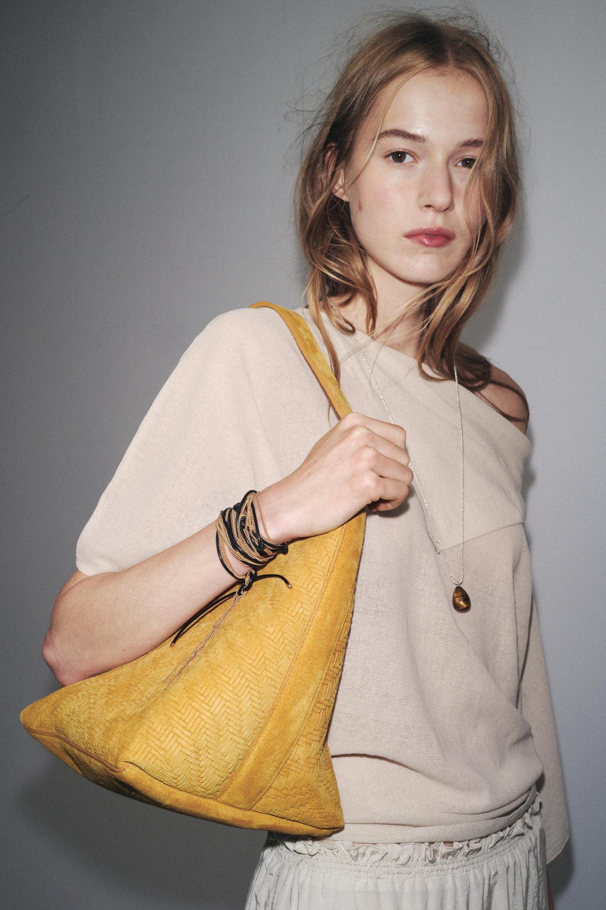BRAIDED SUEDE LEATHER BAG