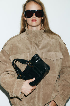 HANDBAG WITH METAL DETAILS