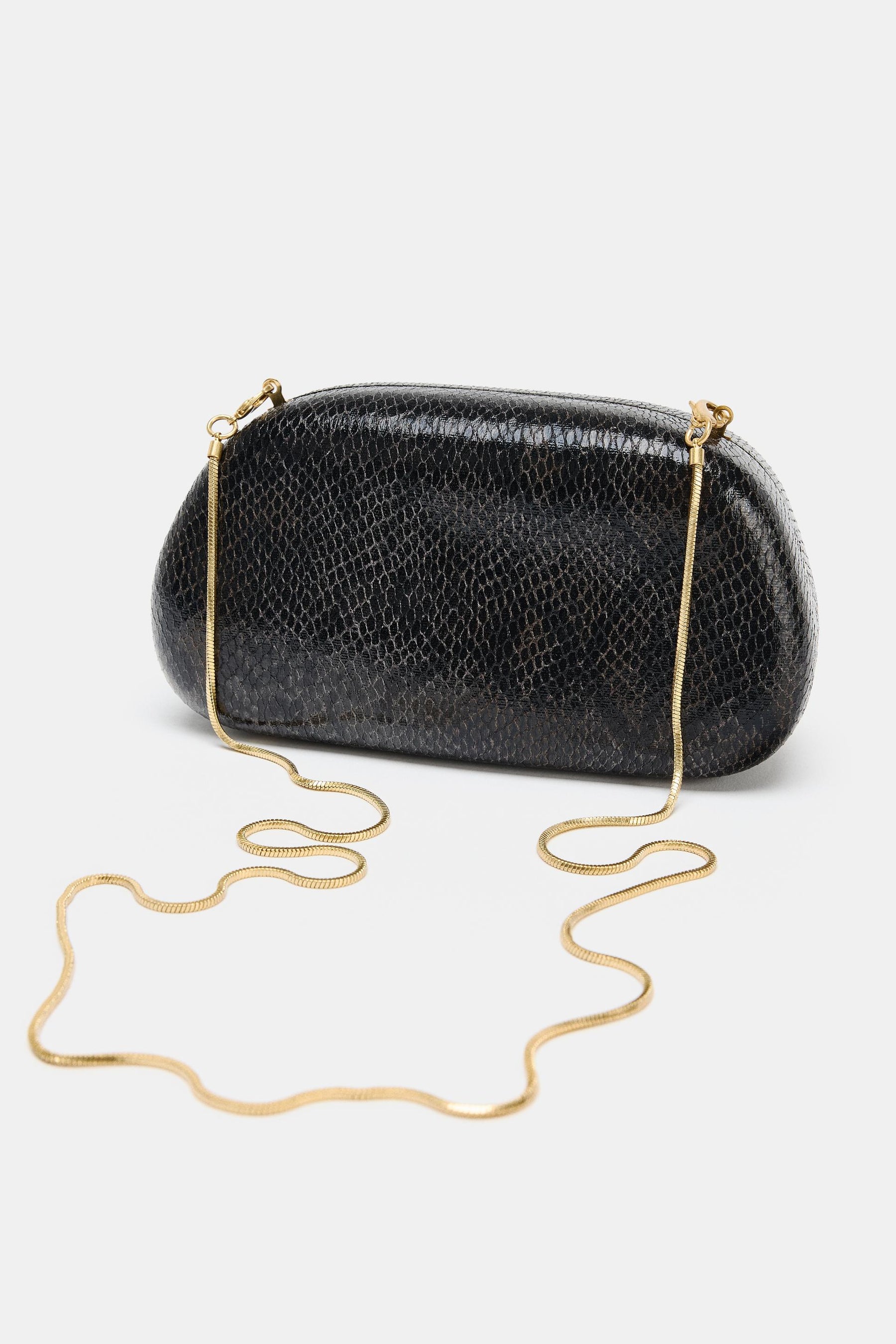EMBOSSED CLUTCH