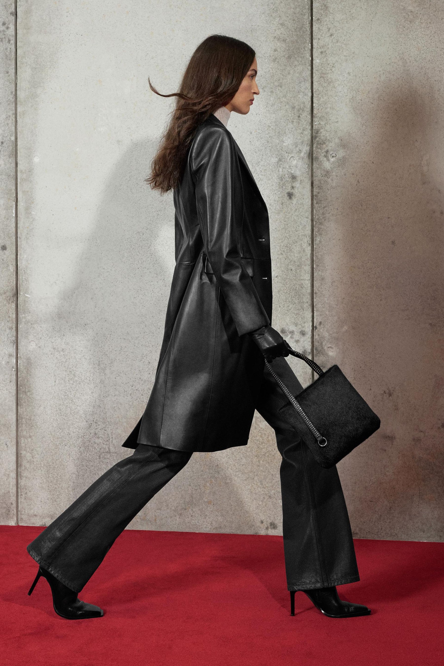 Waxed low-rise bootcut jeans